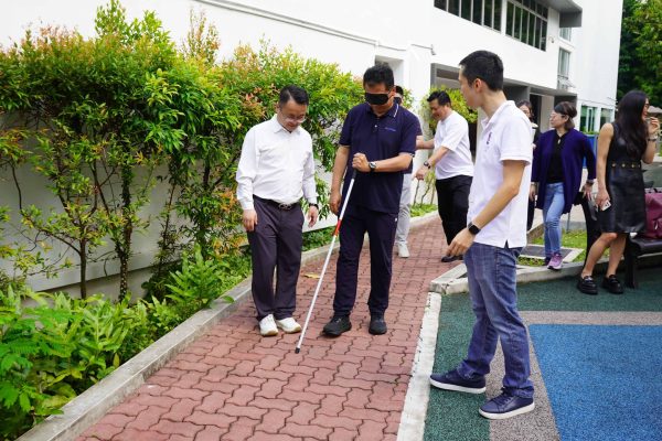 2 participants with walking cane